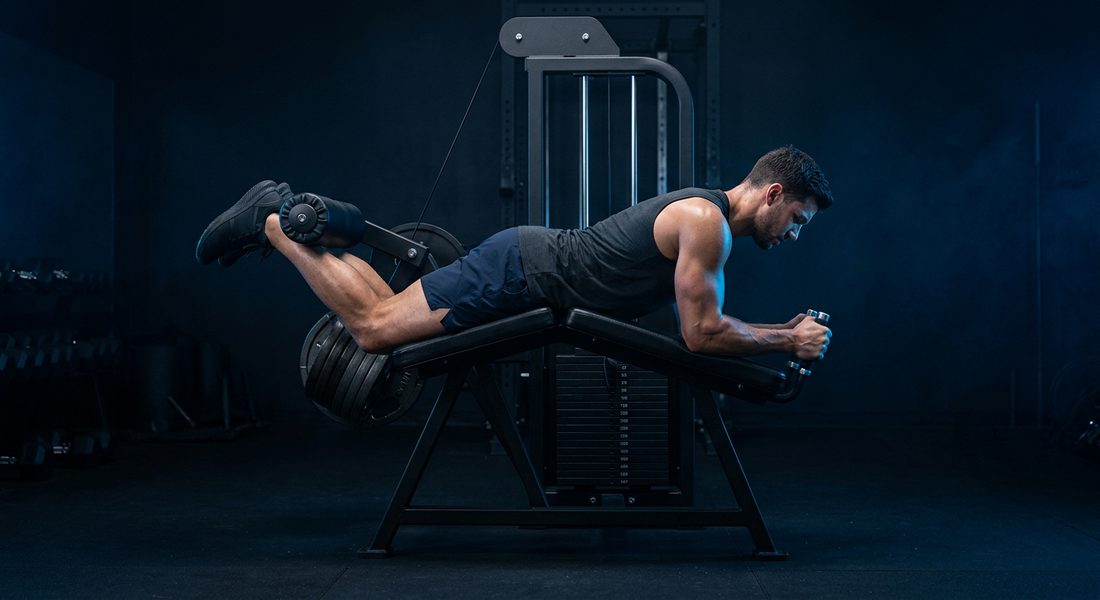 Athlete performing a lying leg curl