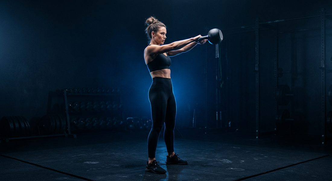 Athlete mid kettlebell swing