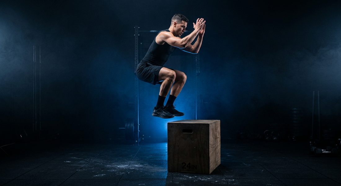 Athlete jumping onto a plyo box